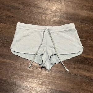 SKIMS Opal French Terry Dolphin Shorts in Pale Blue